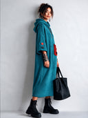 Women’s Fashionable Peacock Blue Hooded Colorblock Knitted Dress ZMZ1684J3SWL