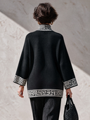 Women’s American Vintage Style Black Key Trim Mock Neck Asymmetric Hem Knit Sweater ZMZ2665J6ZYY