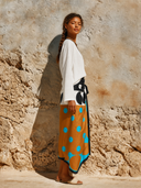 Women's Solid Color Top And Polka Dot Wrap Skirt Two-Piece Set ZMZ2730G2XT