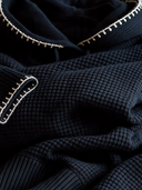 Women's Classic Casual Black Waffle Knit Hooded Pullover Sweater With Contrast Blanket Stitch Trim ZMZ1466J0ZYY